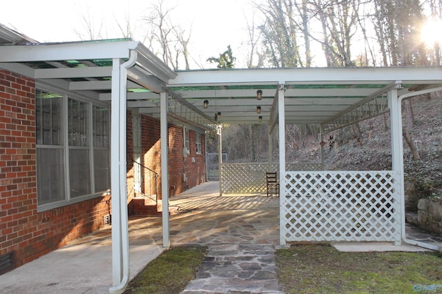 view of patio / terrace featuring a carport