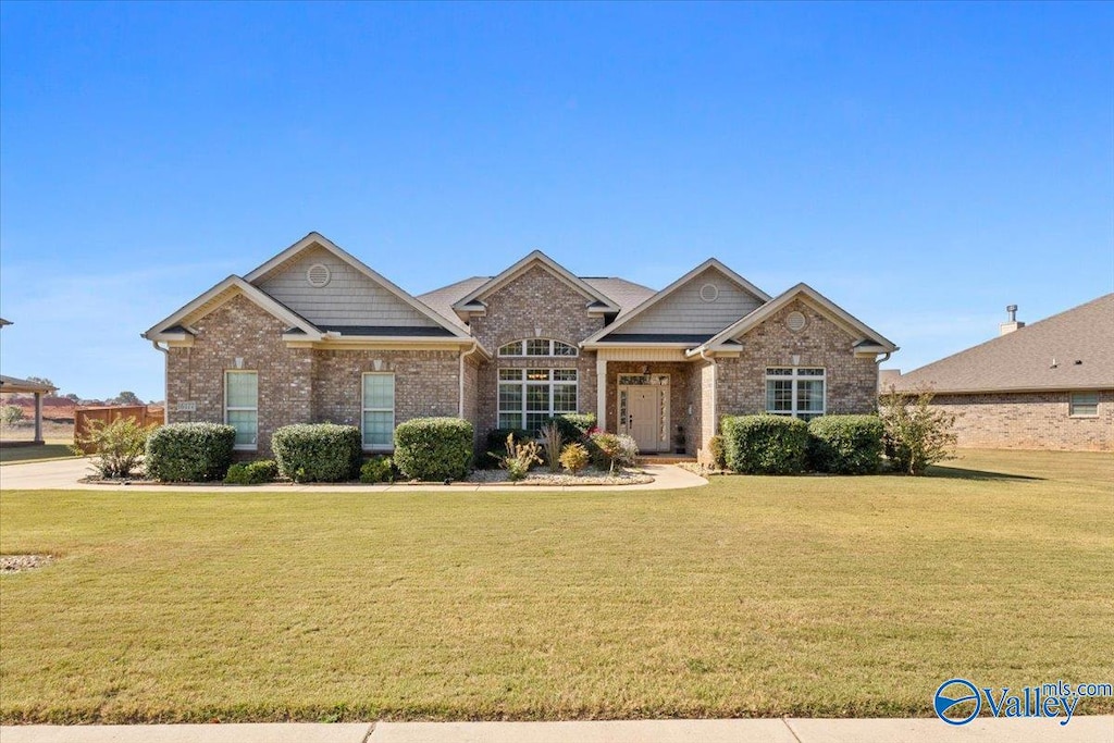 view of front of home with a front lawn