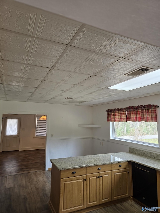 kitchen with dark wood finished floors, visible vents, an ornate ceiling, and black dishwasher