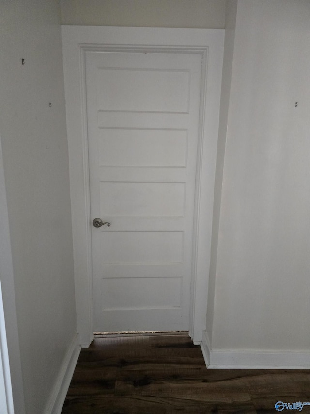 room details featuring wood finished floors and baseboards