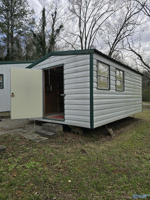 view of outbuilding featuring an outdoor structure