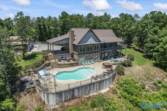 8879 County Road 27, Springville, AL 35146 - view of swimming pool with stairway, a patio, and a wooden deck