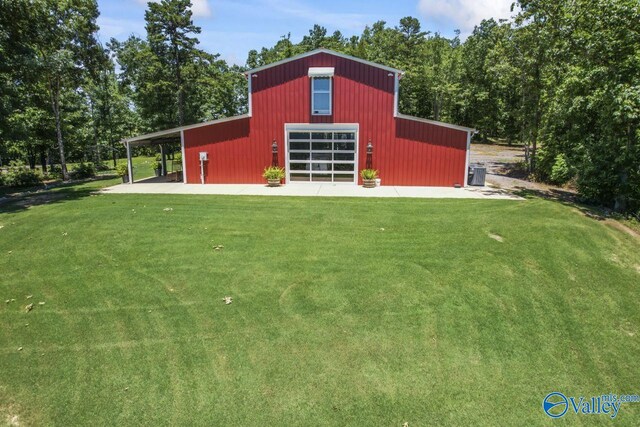 8879 County Road 27, Springville, AL 35146 - view of pole building featuring a yard and central AC