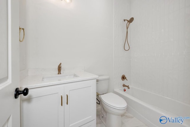 full bathroom featuring tile patterned floors, vanity, tiled shower / bath, and toilet