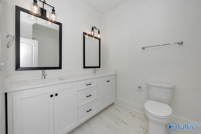 bathroom featuring toilet, double sink vanity, and tile patterned flooring