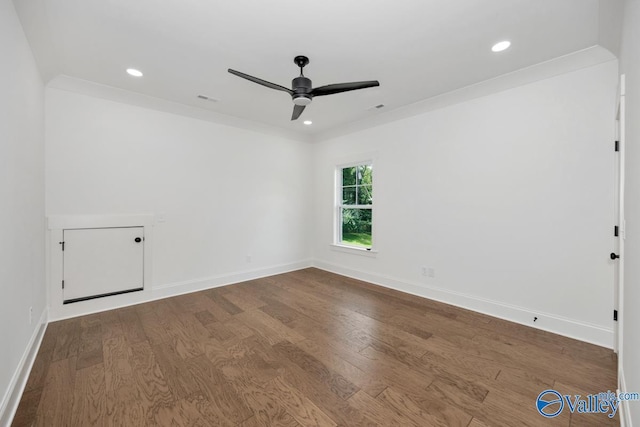 unfurnished room featuring ceiling fan and wood-type flooring