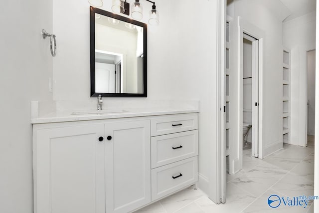 bathroom with tile patterned floors, toilet, and vanity