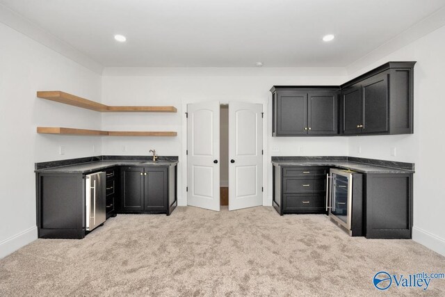 bar with light carpet and beverage cooler