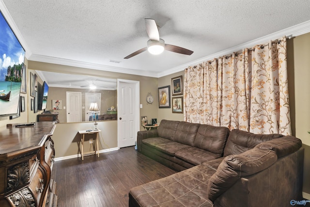 living room with a ceiling fan, a textured ceiling, wood-type flooring, visible vents, and ornamental molding
