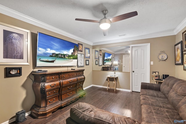 living area featuring a textured ceiling, wood finished floors, ornamental molding, and a ceiling fan