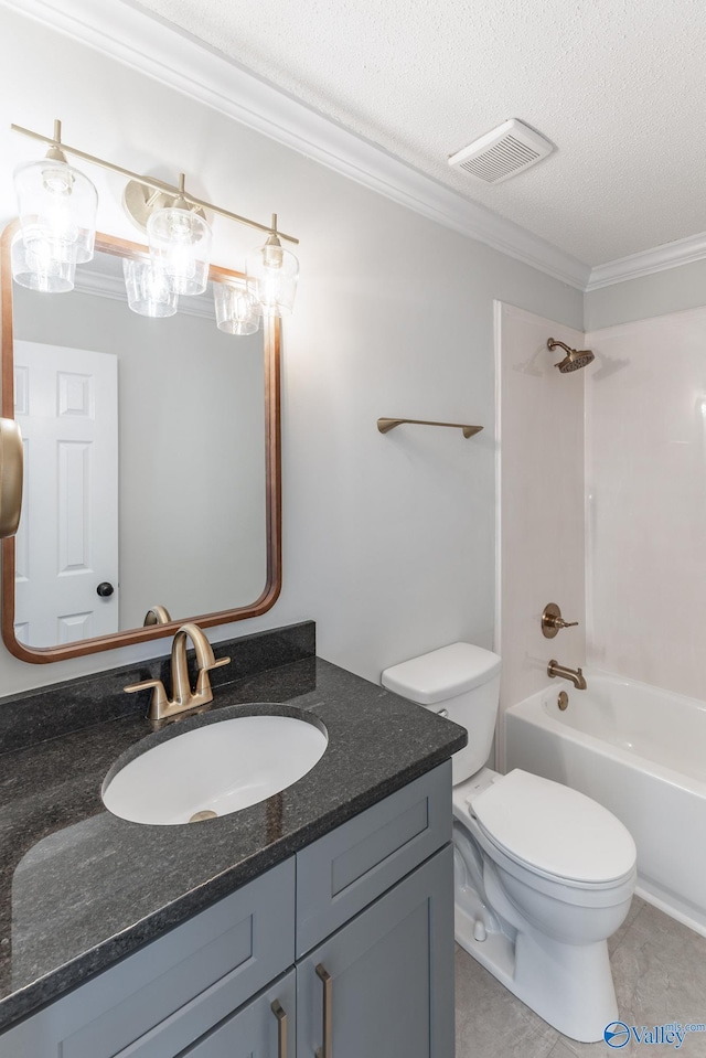 full bathroom featuring tile patterned floors, tub / shower combination, vanity, a textured ceiling, and crown molding