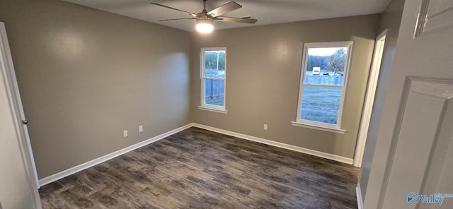 unfurnished room featuring ceiling fan and dark hardwood / wood-style flooring