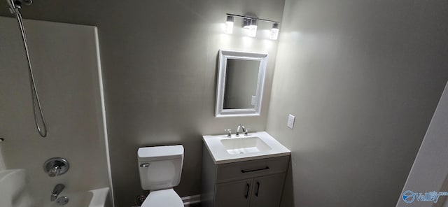 full bathroom with vanity, shower / bath combination, and toilet