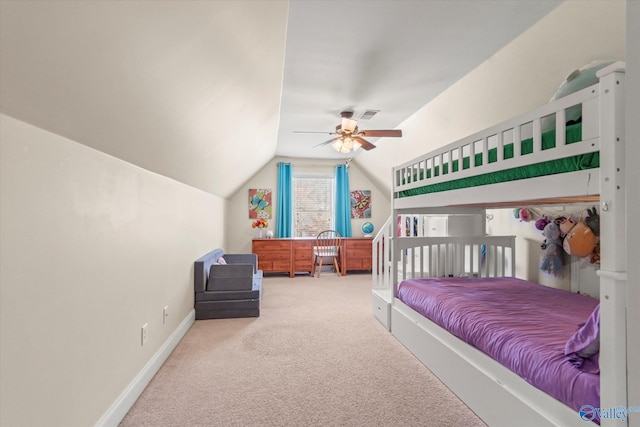 carpeted bedroom with a ceiling fan, lofted ceiling, visible vents, and baseboards