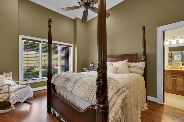 900 Menominee Rd, Langston, AL 35755 - bedroom featuring wood finished floors, ensuite bath, a towering ceiling, and a ceiling fan