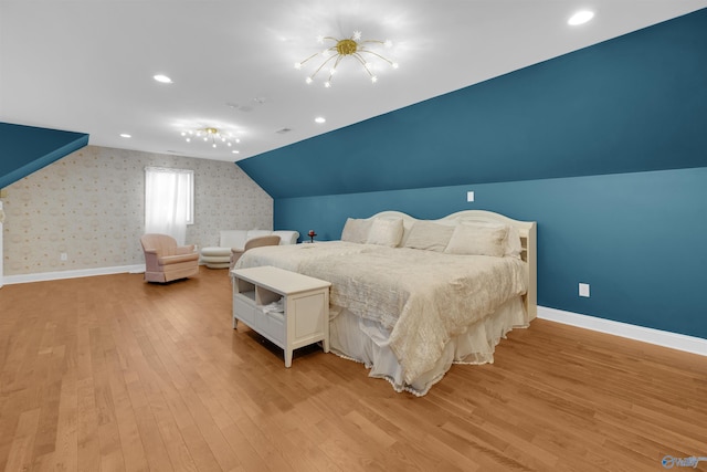 900 Menominee Rd, Langston, AL 35755 - bedroom with light wood-style floors, vaulted ceiling, wallpapered walls, and recessed lighting