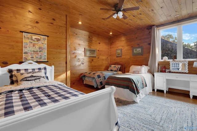 900 Menominee Rd, Langston, AL 35755 - bedroom with wooden walls, wooden ceiling, a ceiling fan, and recessed lighting