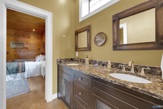 900 Menominee Rd, Langston, AL 35755 - ensuite bathroom featuring wooden walls and double vanity