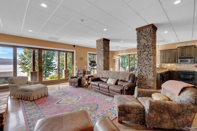 900 Menominee Rd, Langston, AL 35755 - living area with ornate columns, a paneled ceiling, and recessed lighting