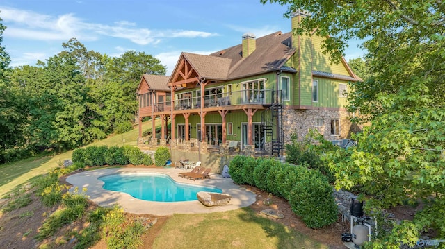 900 Menominee Rd, Langston, AL 35755 - back of house featuring a deck, a patio, a chimney, stone siding, and stairway