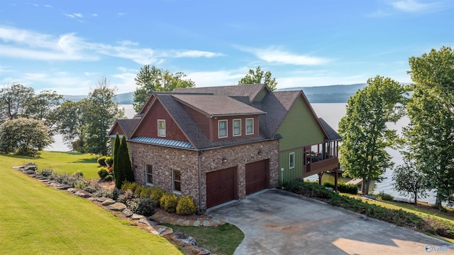 900 Menominee Rd, Langston, AL 35755 - craftsman inspired home featuring stone siding, concrete driveway, a front lawn, an attached garage, and roof with shingles