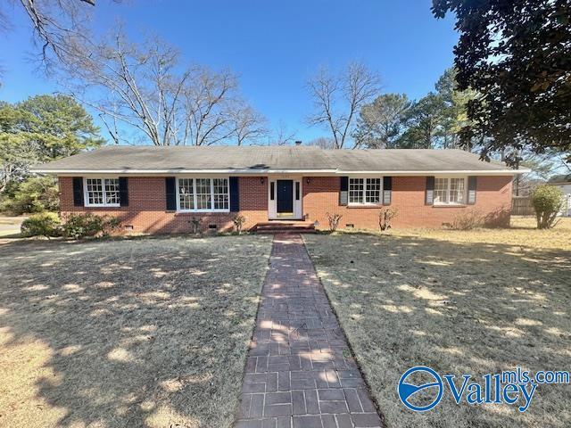 single story home featuring crawl space and brick siding