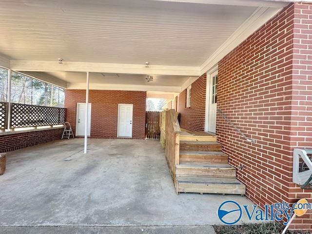 view of patio with an attached carport