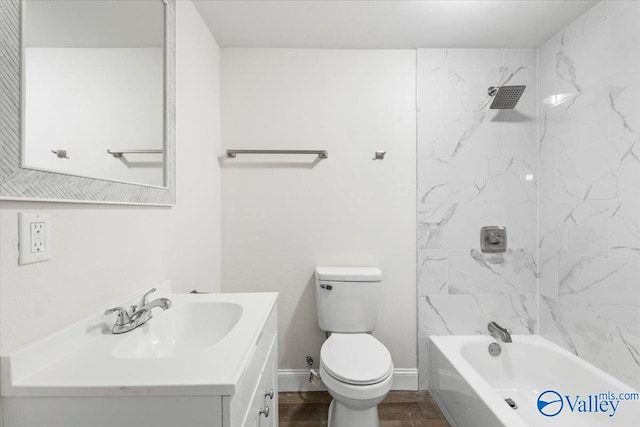 full bathroom featuring vanity, toilet, hardwood / wood-style flooring, and tiled shower / bath combo