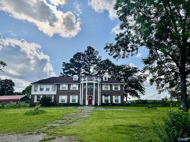 409 County Road 30, Danville, AL 35619 - view of front facade featuring a front yard and brick siding