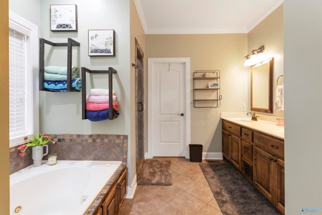 bathroom featuring ornamental molding, tile patterned flooring, vanity, and a washtub