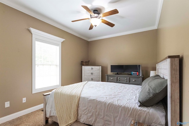 bedroom featuring carpet floors, ornamental molding, and ceiling fan