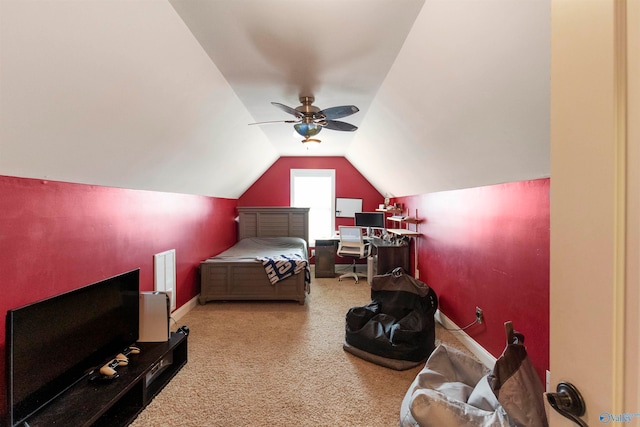 carpeted bedroom with ceiling fan and lofted ceiling