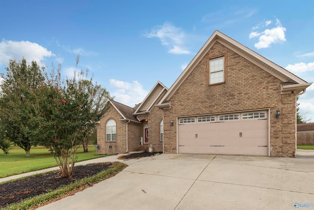 front of property with a garage and a front lawn