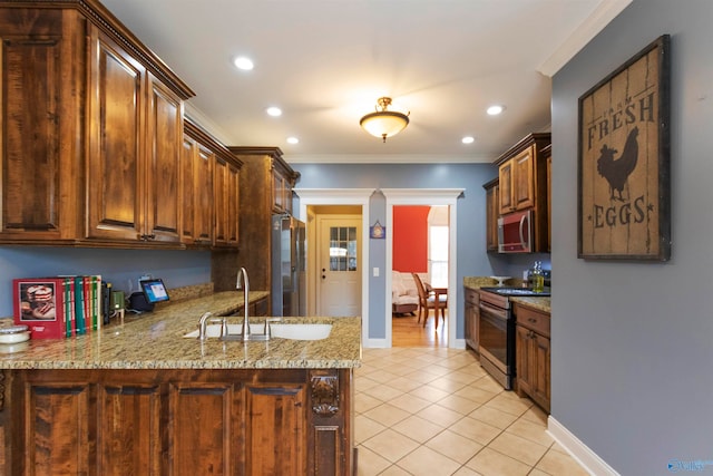 kitchen with light tile patterned flooring, sink, kitchen peninsula, appliances with stainless steel finishes, and ornamental molding