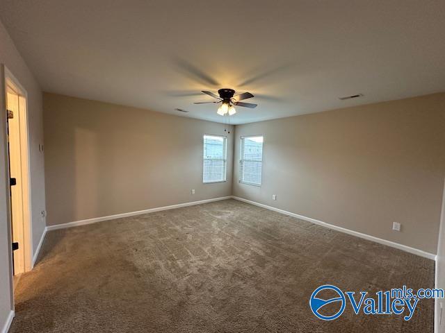 134 Winstead Cir, Owens Cross Roads, AL 35763 - carpeted empty room with a ceiling fan and baseboards