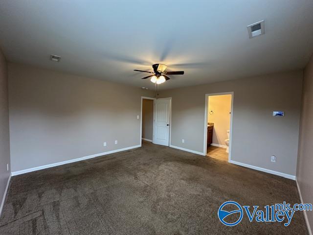 134 Winstead Cir, Owens Cross Roads, AL 35763 - spare room with baseboards, visible vents, ceiling fan, and carpet flooring