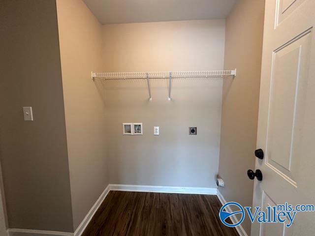 134 Winstead Cir, Owens Cross Roads, AL 35763 - laundry area featuring wood finished floors, baseboards, laundry area, and washer hookup