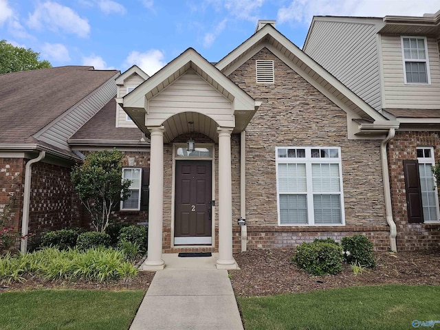 2031 Blake Bottom Rd Unit 2, Huntsville, AL 35806 - entrance to property with stone siding, brick siding, and roof with shingles