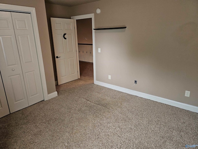 2031 Blake Bottom Rd Unit 2, Huntsville, AL 35806 - unfurnished bedroom featuring carpet and a closet