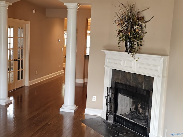 2031 Blake Bottom Rd Unit 2, Huntsville, AL 35806 - detailed view of decorative columns, wood finished floors, and a tiled fireplace