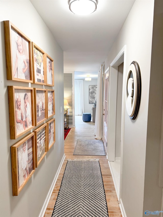 659 Vaughn Bridge Rd NW, Hartselle, AL 35640 - hallway with light wood-type flooring and baseboards