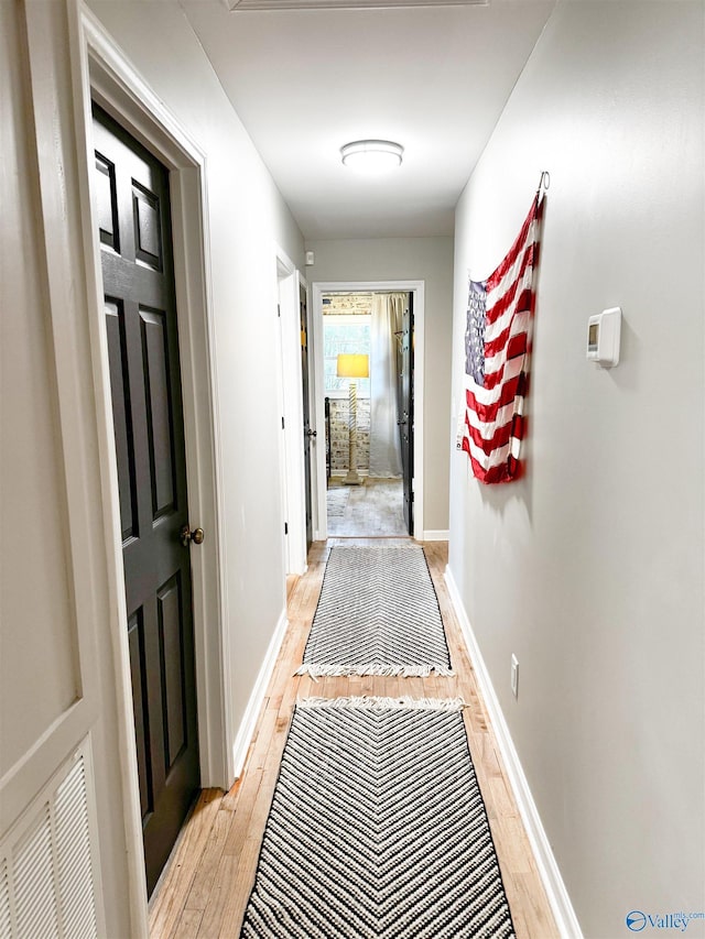 659 Vaughn Bridge Rd NW, Hartselle, AL 35640 - hall featuring light wood-style floors and baseboards