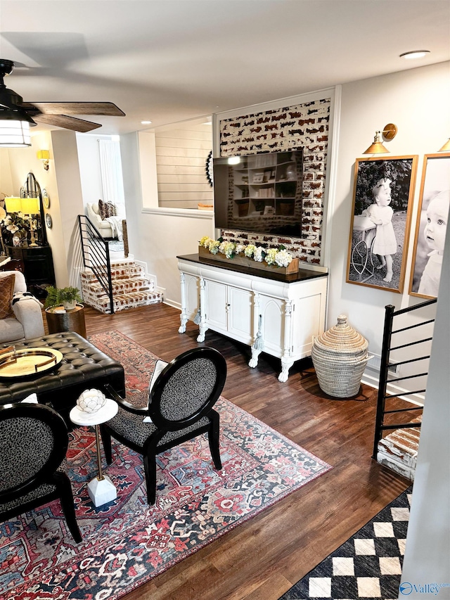 659 Vaughn Bridge Rd NW, Hartselle, AL 35640 - living room with dark wood-style floors, a ceiling fan, and stairway