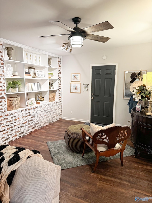 659 Vaughn Bridge Rd NW, Hartselle, AL 35640 - living room with a wood stove, ceiling fan, wood finished floors, baseboards, and built in features