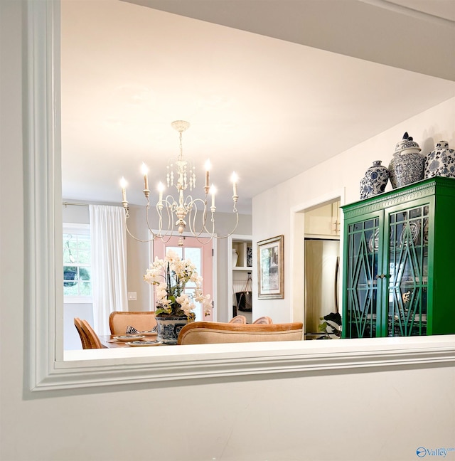 659 Vaughn Bridge Rd NW, Hartselle, AL 35640 - detailed view of a chandelier and refrigerator
