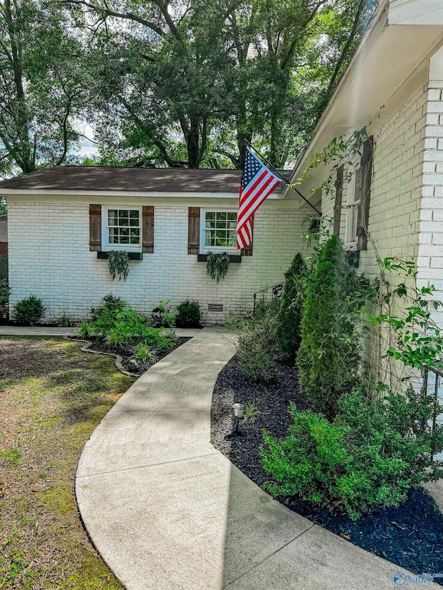 659 Vaughn Bridge Rd NW, Hartselle, AL 35640 - view of front of home featuring brick siding and crawl space