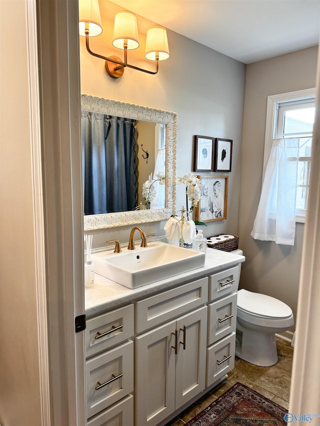 659 Vaughn Bridge Rd NW, Hartselle, AL 35640 - full bathroom featuring vanity and toilet