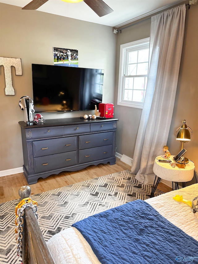 659 Vaughn Bridge Rd NW, Hartselle, AL 35640 - bedroom featuring light wood-type flooring and baseboards