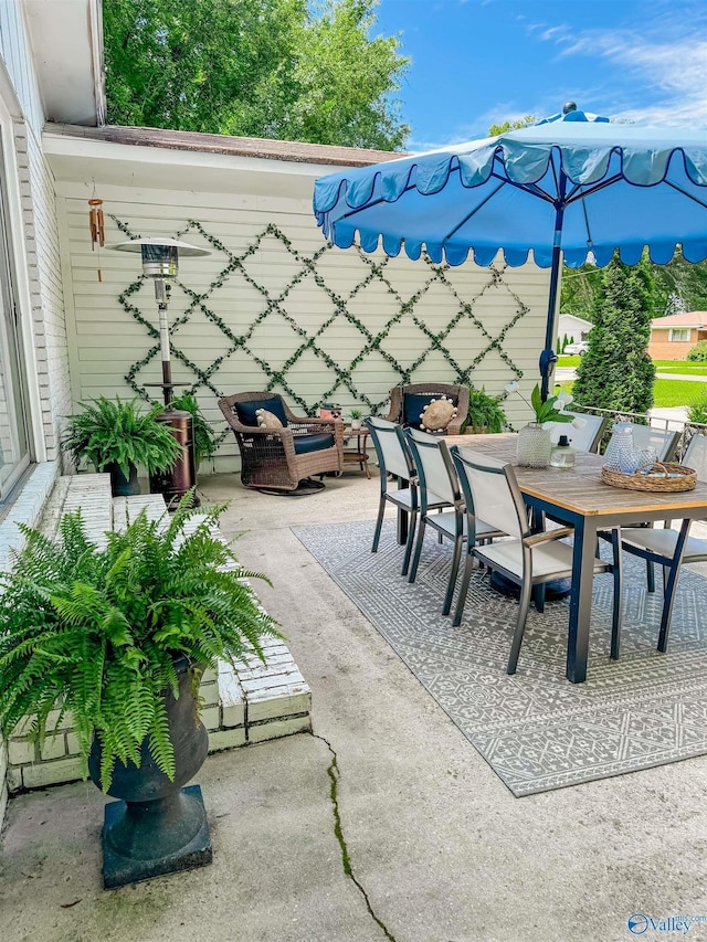 659 Vaughn Bridge Rd NW, Hartselle, AL 35640 - view of patio featuring outdoor dining area