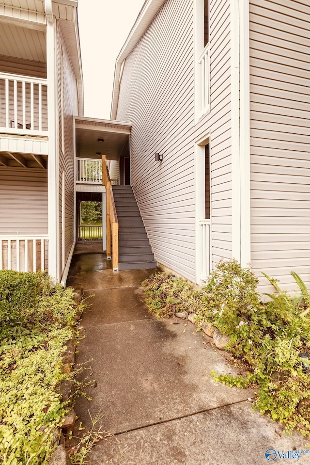 view of property exterior with stairway